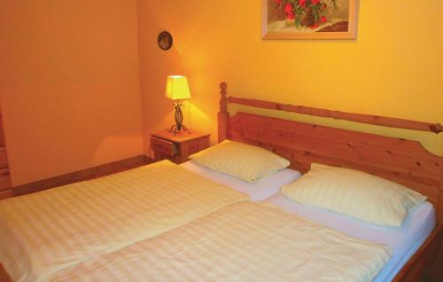 Postel nebo postele na pokoji v ubytování Nice Apartment In Thulendorf-sagerheide With Kitchenette