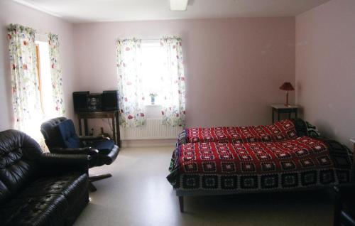 Ένα ή περισσότερα κρεβάτια σε δωμάτιο στο Awesome Apartment In Saxtorp With Wifi