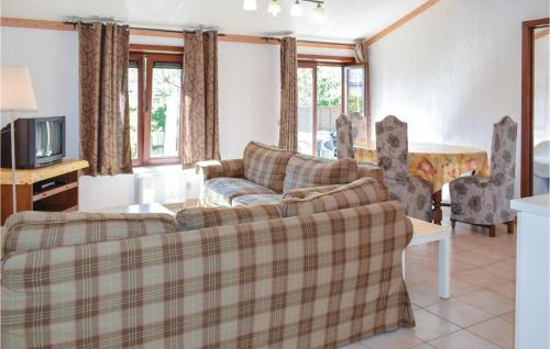 TV a/nebo společenská místnost v ubytování Bredene Beach