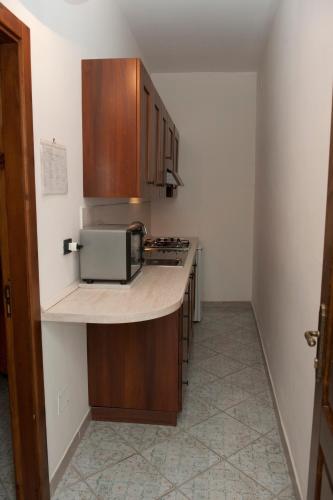 Küche/Küchenzeile in der Unterkunft Casa Vacanze - Affittacamere Il Tempone