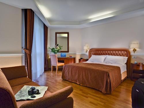 Katil atau katil-katil dalam bilik di Hotel Eliseo Terme