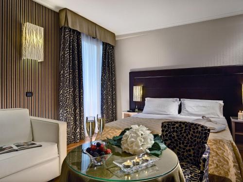 Katil atau katil-katil dalam bilik di Hotel Eliseo Terme