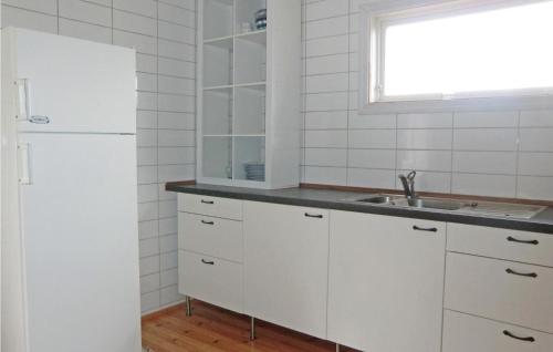 A kitchen or kitchenette at Nice Home In Lttorp With Kitchen