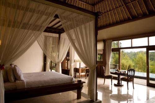 Säng eller sängar i ett rum på The Payogan Villa Resort and Spa