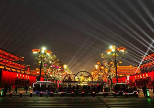 a city street at night with red lights at Ramada Plaza by Wyndham Xi'an South in Xi'an