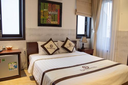 Katil atau katil-katil dalam bilik di Ngo House Villa