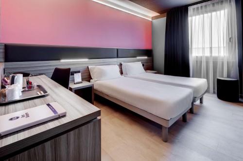 Cama ou camas em um quarto em Best Western Aries Hotel