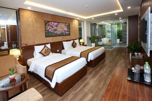 Postel nebo postele na pokoji v ubytování Nagila Boutique Hotel
