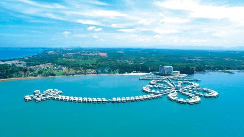 an aerial view of a marina with boats in the water at Lexis Hibiscus Port Dickson in Port Dickson