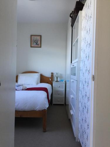 A bed or beds in a room at Church St Accommodation in Parramatta CBD