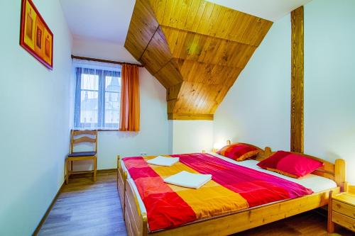 Postel nebo postele na pokoji v ubytování Apartment Rokys