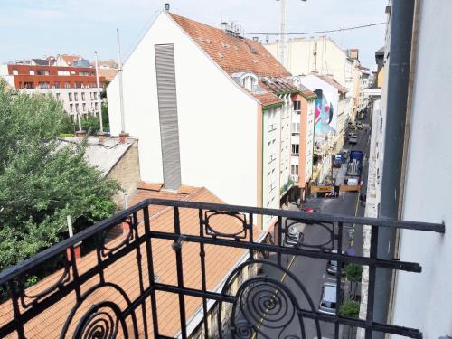 a view of a building from a balcony at White Pearl Rooms near Gozsdu in Budapest