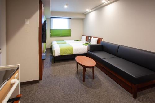 Letto o letti in una camera di Kitanoniwa The Kuretakeso