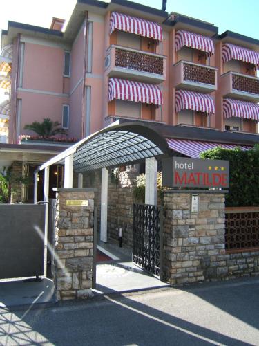 a hotel marlite sign in front of a building at Hotel Matilde in Marina di Massa
