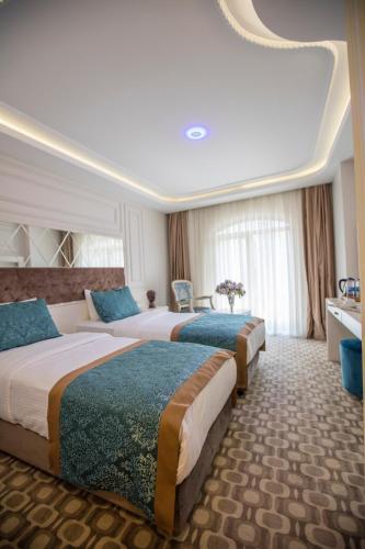 Vuode tai vuoteita majoituspaikassa Dodo Hotel Spa Old City