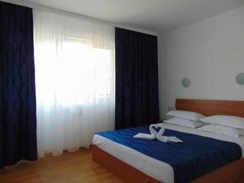 Postel nebo postele na pokoji v ubytování Casa Albatros