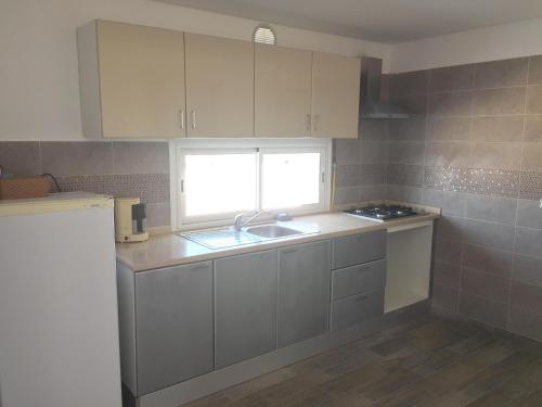 Kuchyň nebo kuchyňský kout v ubytování Penthouse avec vue imprenable sur mer
