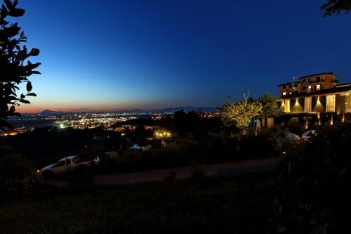 a view of a city at night at Tenuta Lisetta in Monterotondo