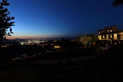 a view of a city at night at Tenuta Lisetta in Monterotondo