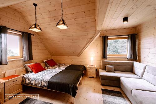 Кровать или кровати в номере Chaty pod Śnieżką