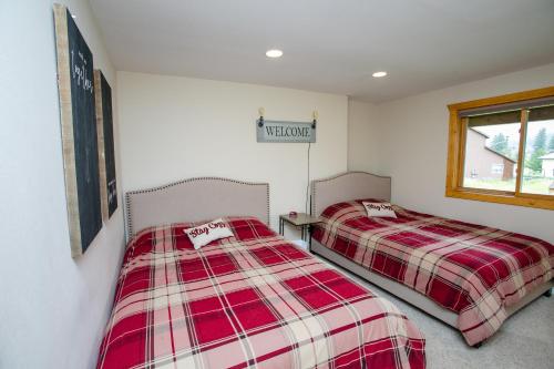 Ένα ή περισσότερα κρεβάτια σε δωμάτιο στο Nederland Getaway Home