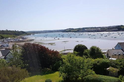 a view of a river with boats in the water at Moorings View in Instow