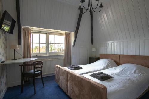 Krevet ili kreveti u jedinici u okviru objekta Het Klooster van Dalfsen