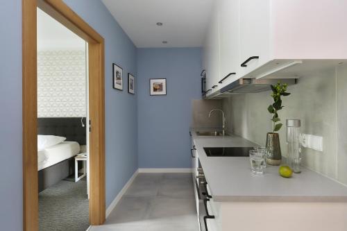 a kitchen with a sink and a counter top at Vrestpoint in Gdańsk
