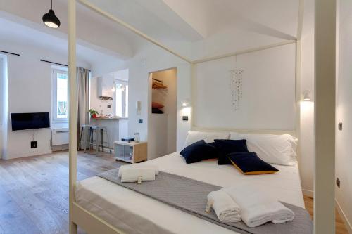 Posteľ alebo postele v izbe v ubytovaní Scala Apartment by Mamo Florence