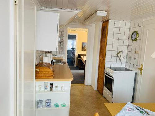 Ett badrum på Haus Boy Jensen Wohnung Dünenblick