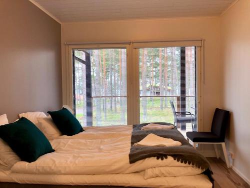 Voodi või voodid majutusasutuse Kustavin Lootholma toas