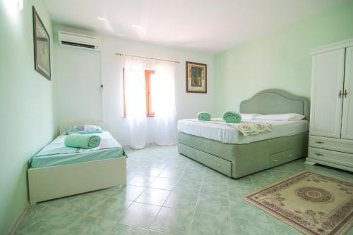 Krevet ili kreveti u jedinici u okviru objekta Villa Old Garden