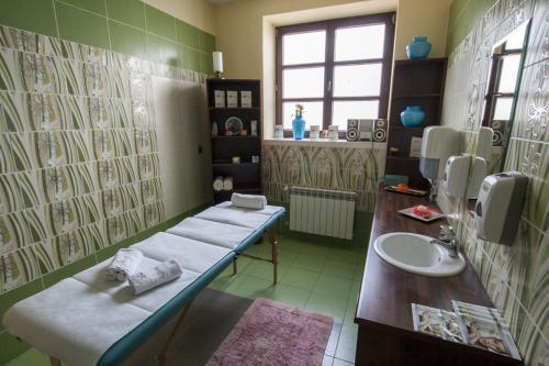 Postel nebo postele na pokoji v ubytování Hotel Rytwiany