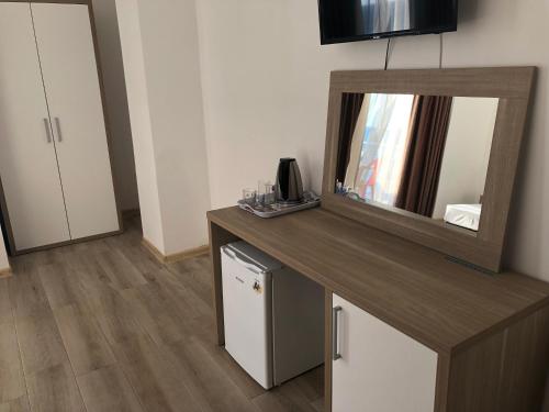 Kuchyň nebo kuchyňský kout v ubytování M-Rooms