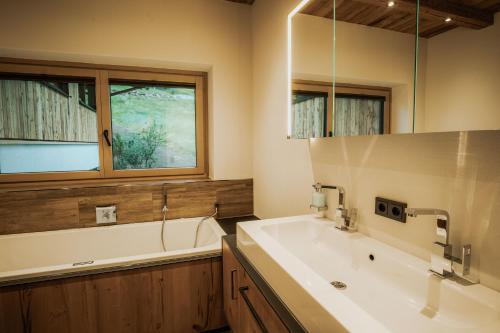 Ванна кімната в Rufana Alpin