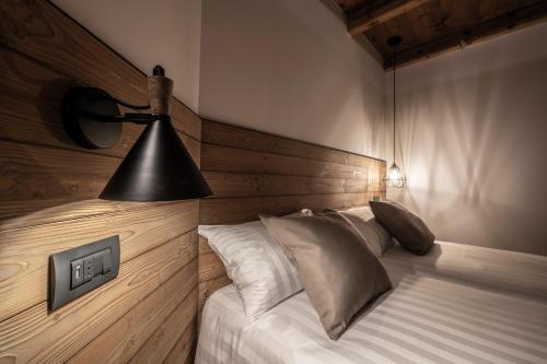 Postel nebo postele na pokoji v ubytování Casa Pasini-Foresteria