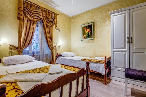 Postel nebo postele na pokoji v ubytování Villa Donković