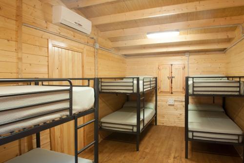 Palanda nebo palandy na pokoji v ubytování Alojamiento Rural Coto de la Isleta