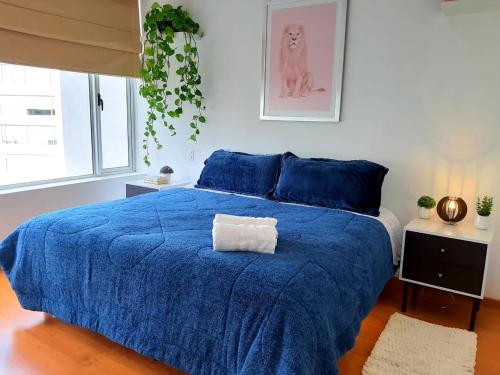 Кровать или кровати в номере Room In Residential WTC