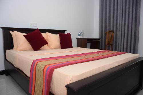 Postel nebo postele na pokoji v ubytování Gold inn