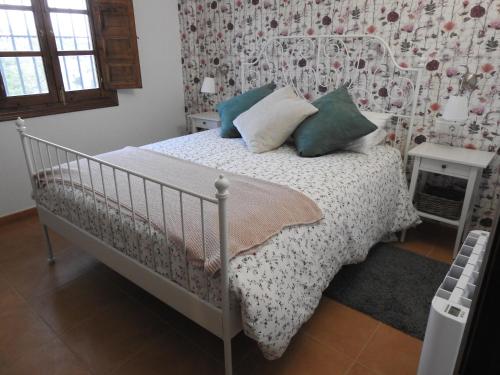 Postel nebo postele na pokoji v ubytování CASA DE LOS ALAMOS