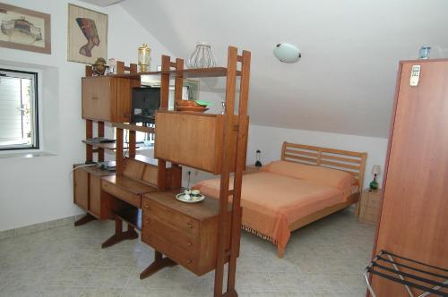 A bed or beds in a room at Bujanic Apartments