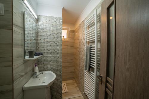 Ett badrum på Nice&Cozy Apartament
