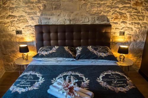Кровать или кровати в номере Oli mare