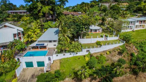 an aerial view of a house on a hill at Harbour Views in Port Vila
