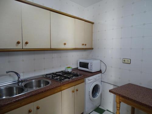 Kuchyň nebo kuchyňský kout v ubytování Apartamento Casa de la Parra