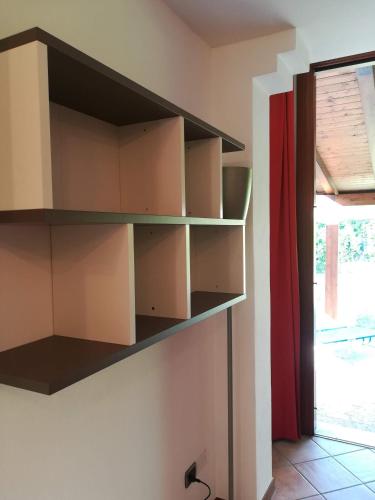 a room with shelves on the wall at Luxury Villa Duna Verde in Duna Verde