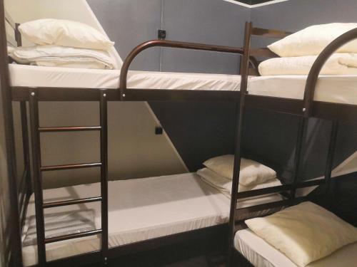 a group of bunk beds in a room at Yourhostel Университет in Kyiv