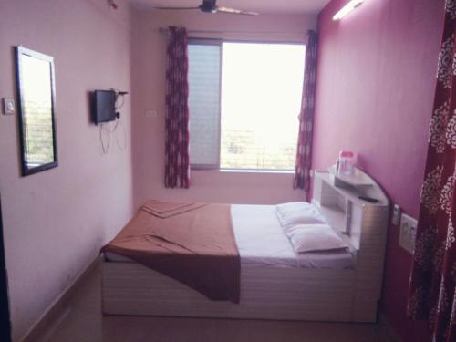 Katil atau katil-katil dalam bilik di Relax inn