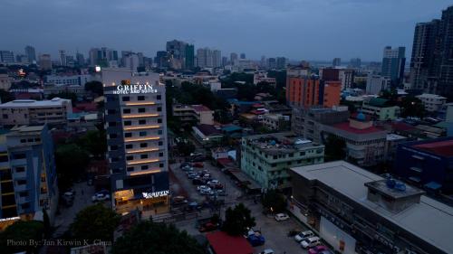 a view of a city with cars and buildings at Griffin Hotel and Suites in Cebu City